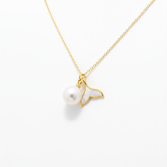 Pearl whale tail necklace solo product shot on white background