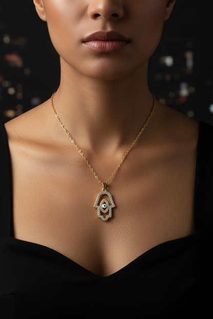 Lifestyle — woman wearing CZ Hamsa Necklace, black top