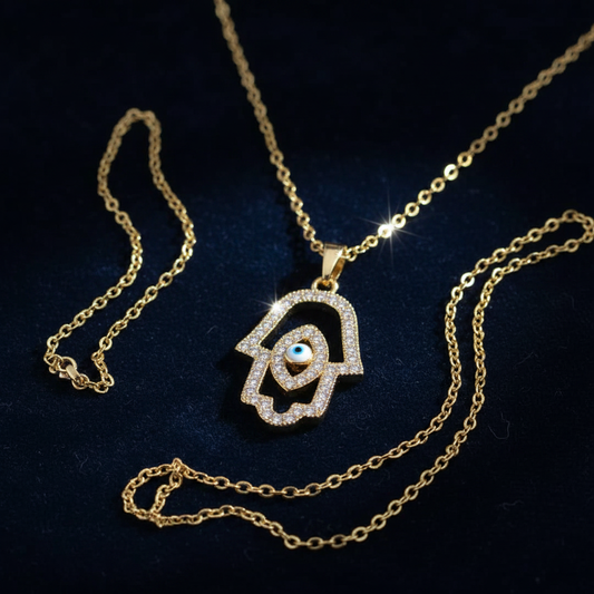 CZ Hamsa Evil Eye Necklace — navy velvet showcase