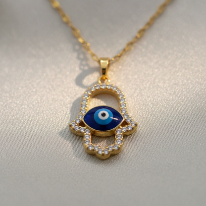 Close-up macro of Hamsa evil eye zirconia pendant