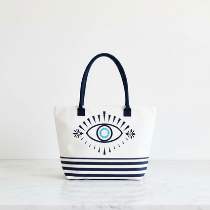 The Mara Bag on white marble flat lay