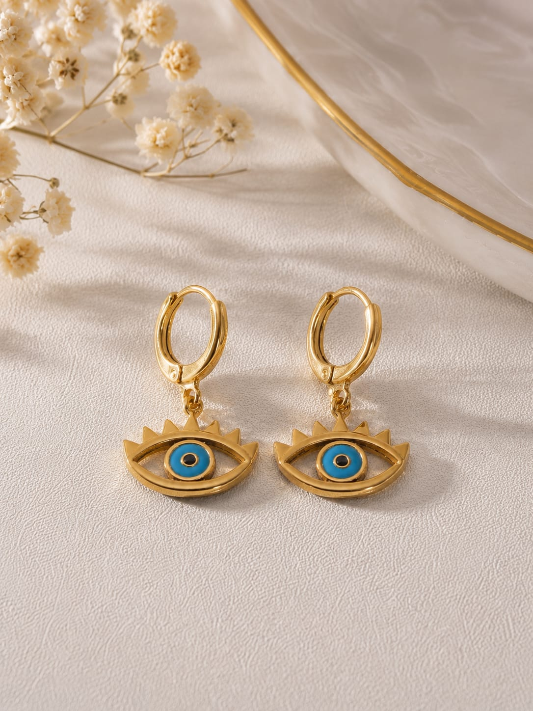 The Amaya Huggies — Turquoise Lash Evil Eye